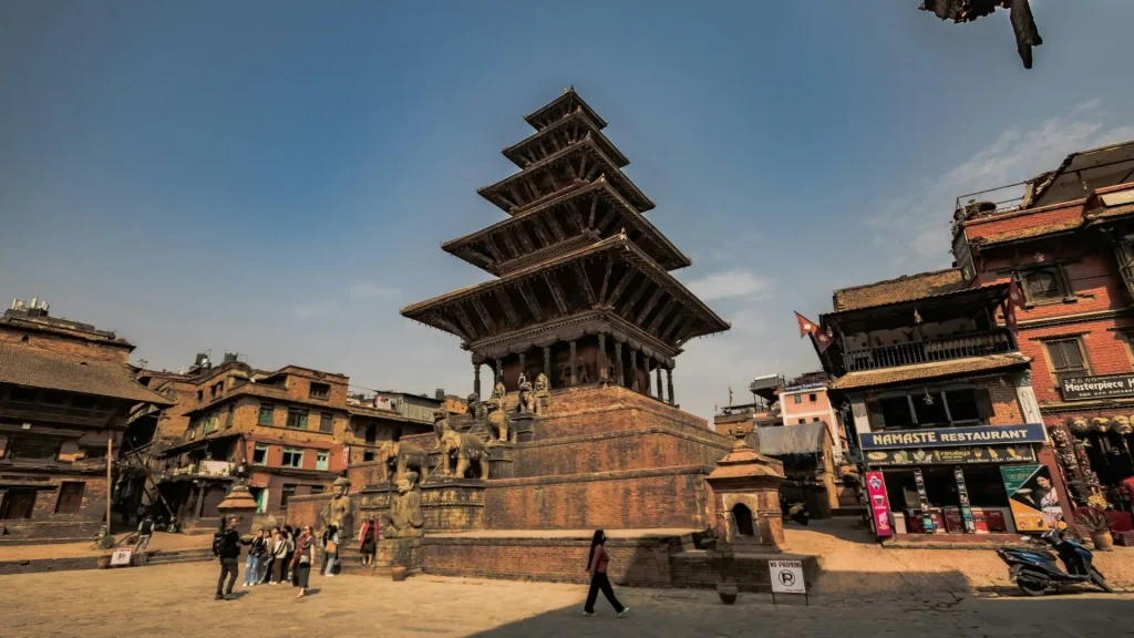 Ancient multi-tiered pagoda temples and stone architecture at Durbar Square in Kathmandu Valley Nepal