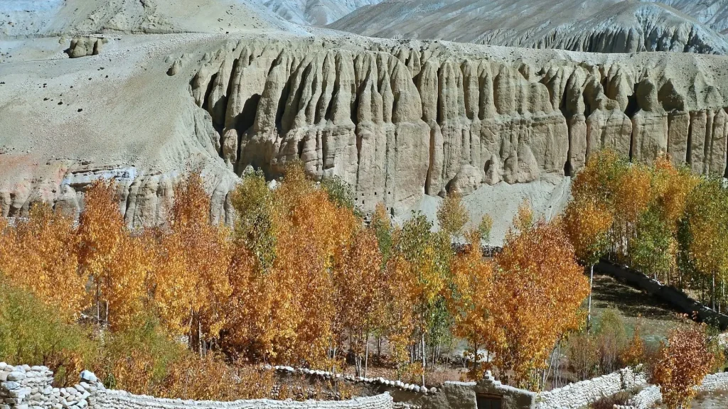 Lo Manthang area in Upper Mustang Nepal with rugged cliffs and Himalayan valley