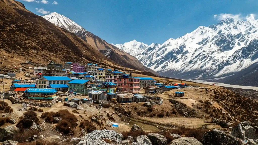 Scenic view of Kyanjin Gompa village and snow-capped Himalayan peaks in Langtang Valley, Nepal