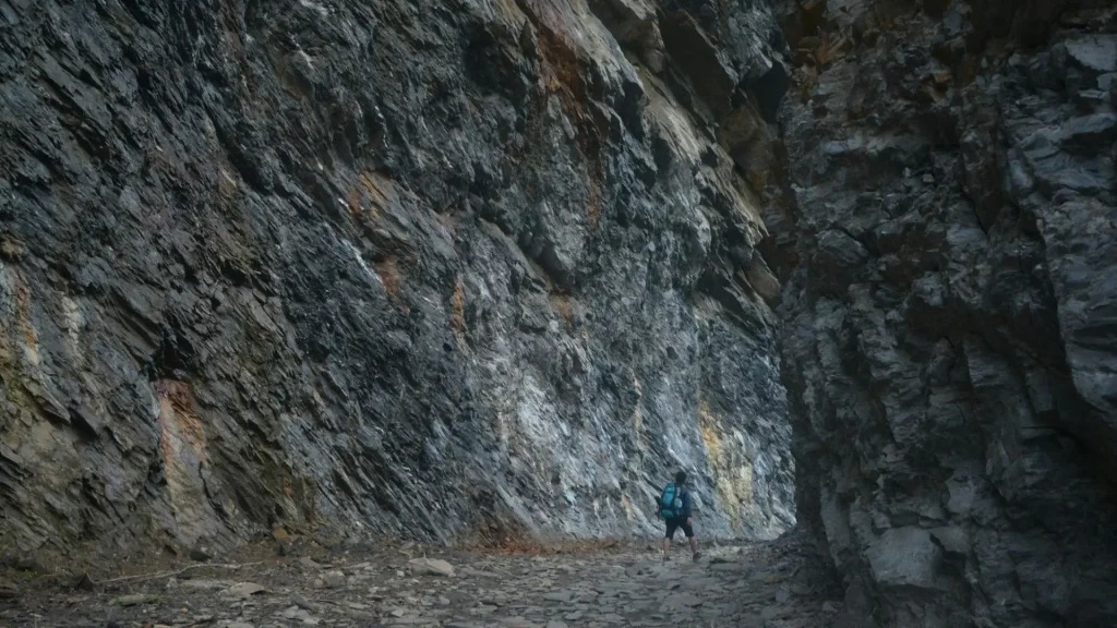 Trekker walking on the Manaslu Circuit Trek trail in Nepal