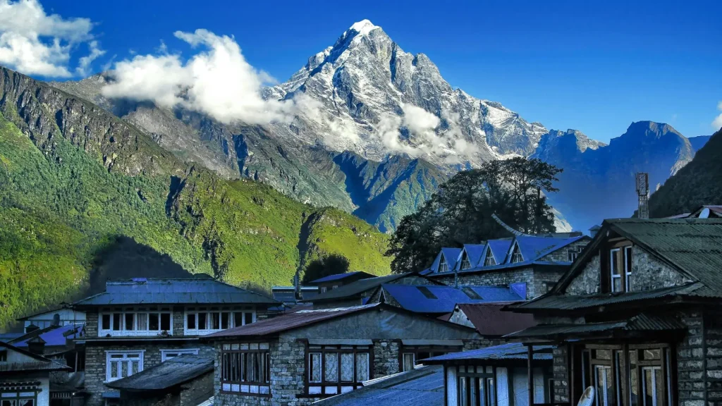 Annapurna region with a house in front and mountain in background