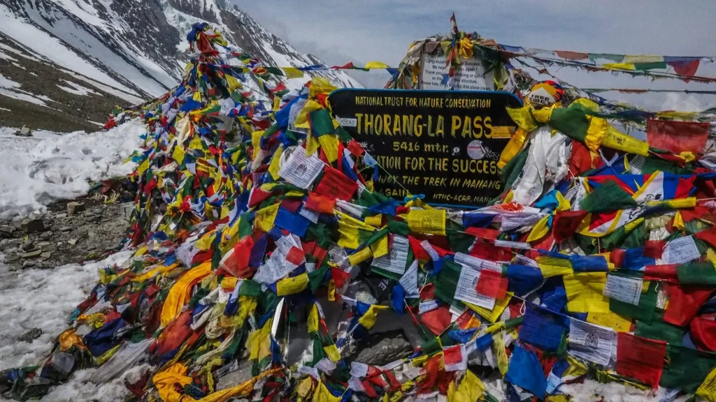 prayer-flags-at-thorong-la-pass-high-mountain-pass-at-5416m-altitude-in-nepal