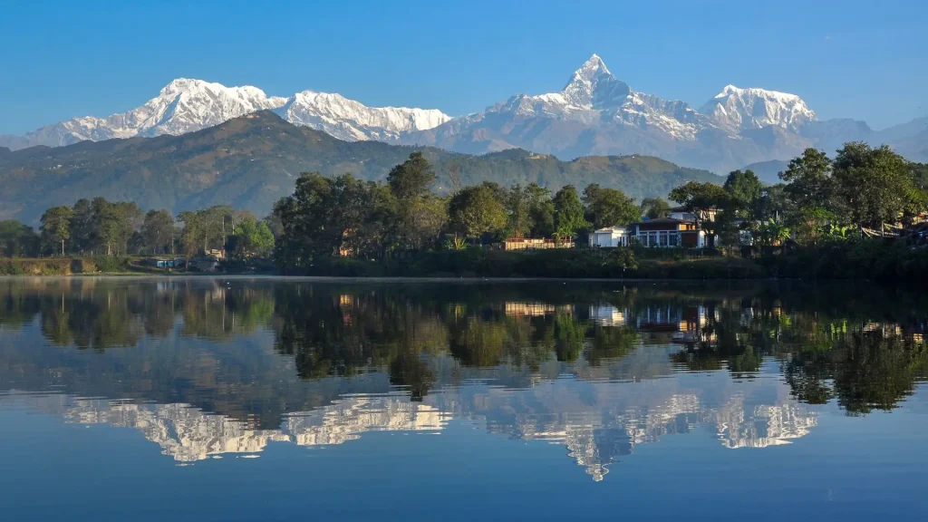 view of phewa lake with mountain in pokhara